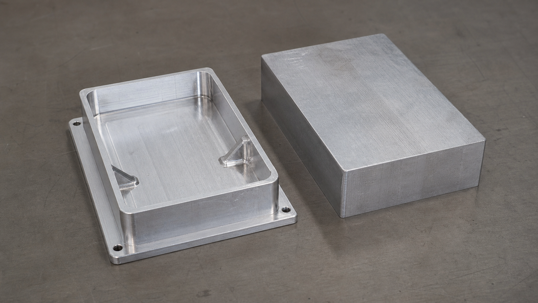 CNC-machined aluminum enclosure with thin walls, ribs, and a thicker base flange